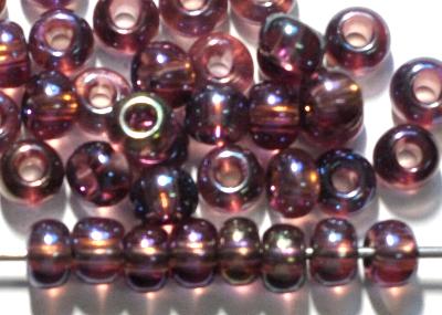 Rocailles von Preciosa Ornella Tschechien, violett transp. mit AB (irisierend)