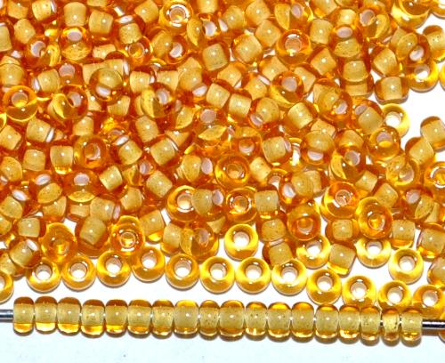 Rocailles von Ornella Preciosa Tschechien, topas transp. mit Farbeinzug weiß