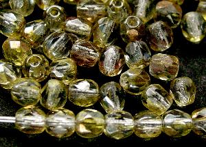 facettierte Glasperlen, oliv transp. mit AB, hergestellt in Gablonz / Tschechien