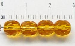 facettierte Glasperlen
 honiggelb transp.,
 hergestellt in Gablonz / Tschechien
